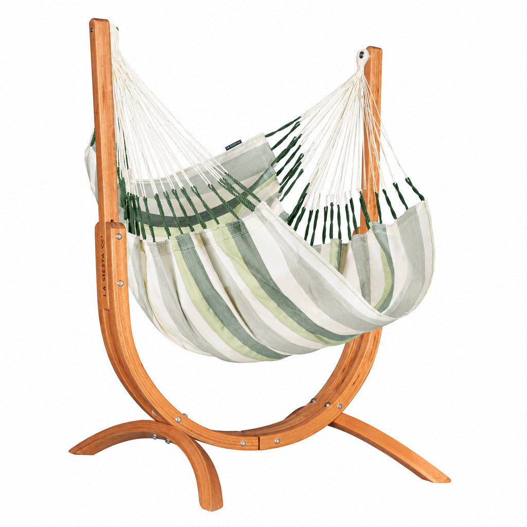 Striped hammock on a wooden stand against a white background