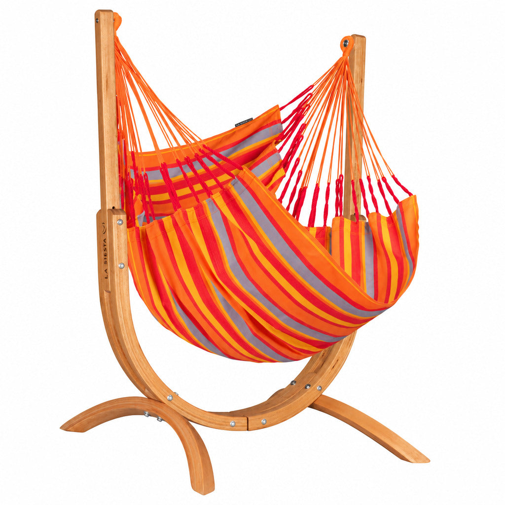 Orange and red striped hammock chair on a wooden stand against a white background