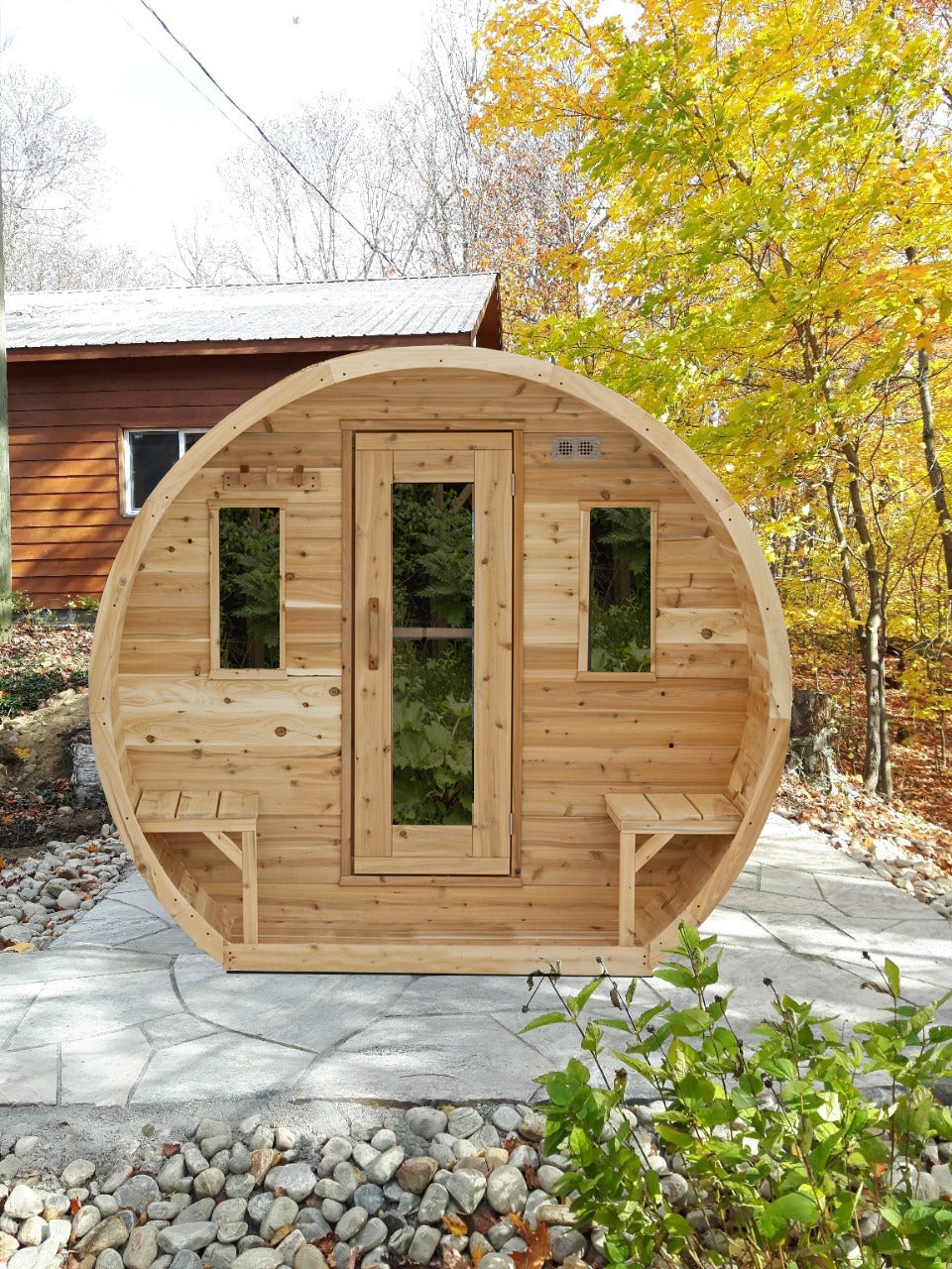 LeisureCraft Elation CTC2424 outdoor sauna in lakeside setting