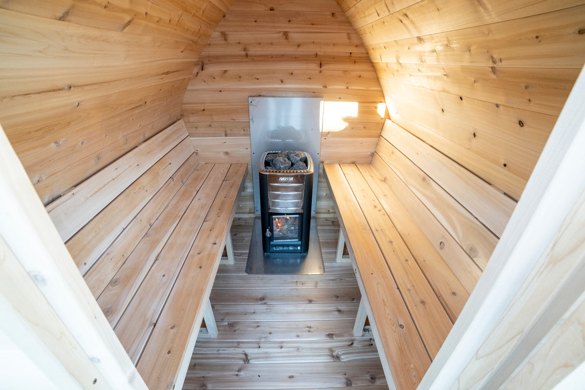 LeisureCraft Canadian Timber MiniPOD CTC77M interior with wood-burning heater