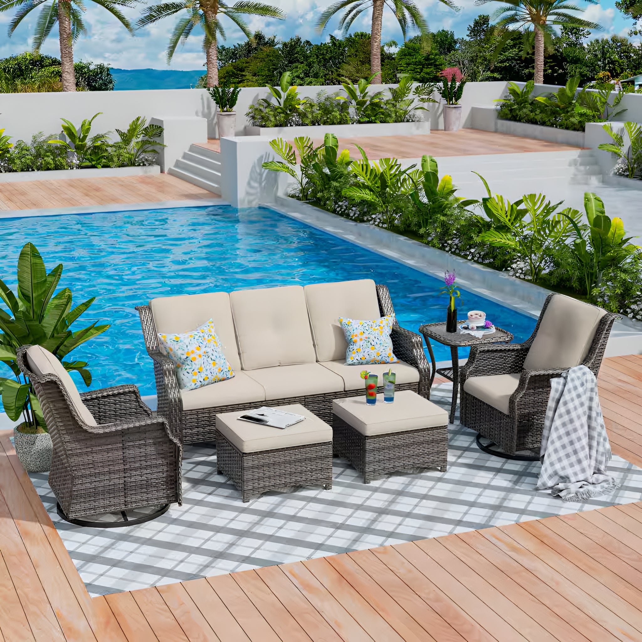 Outdoor patio set with furniture by a poolside in a tropical setting