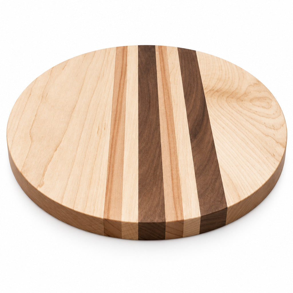 Round wooden cutting board with striped pattern on a gray background